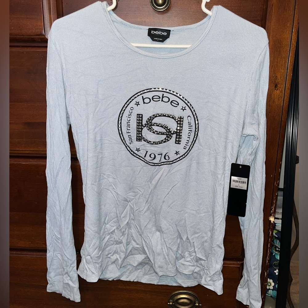 Bebe large long sleeved shirt
